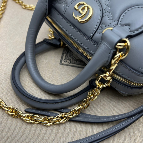 G*u*i gg matelassé leather top handle bag