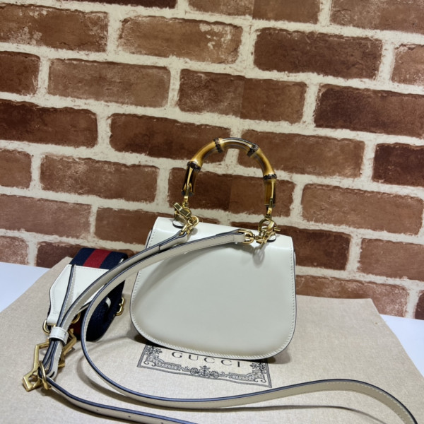 G*u*i mini top handle bag with bamboo