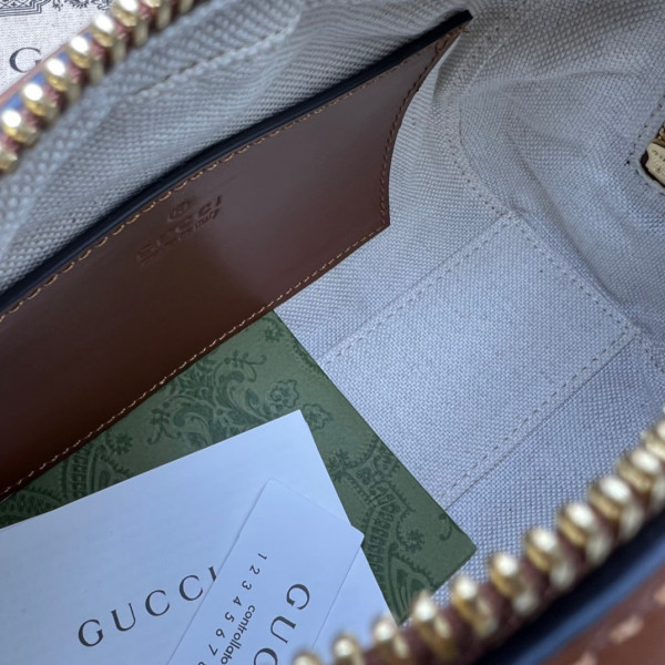 G*u*i gg matelassé leather top handle bag