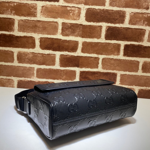G*u*i gg embossed messenger bag
