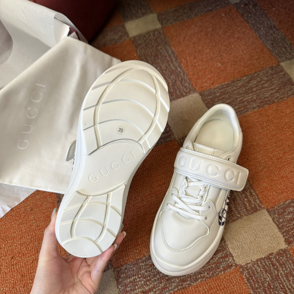 G*u*i men&women sneakers