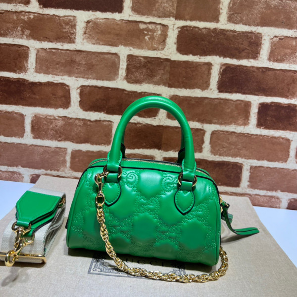 G*u*i gg matelassé leather top handle bag