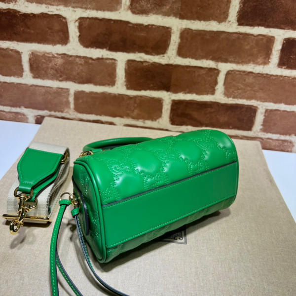 G*u*i gg matelassé leather top handle bag