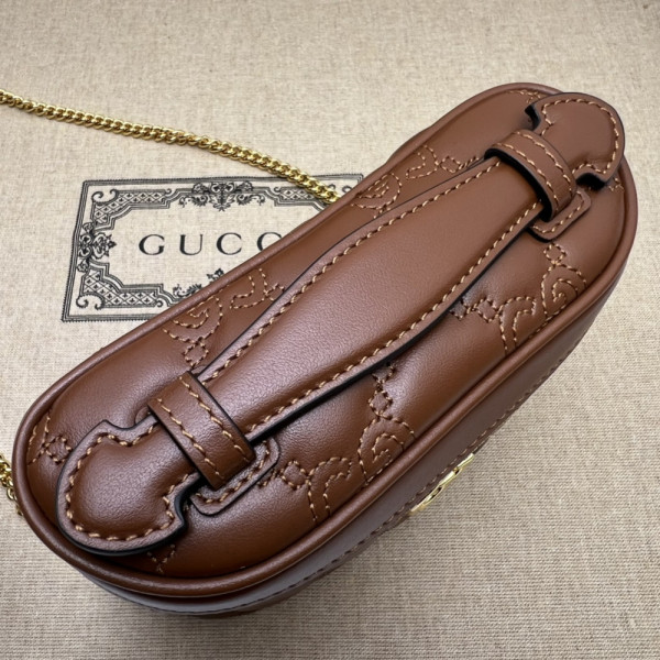 G*u*i gg matelassé top handle mini bag
