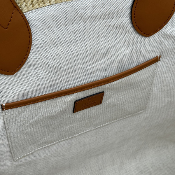 G*u*i medium straw-effect tote