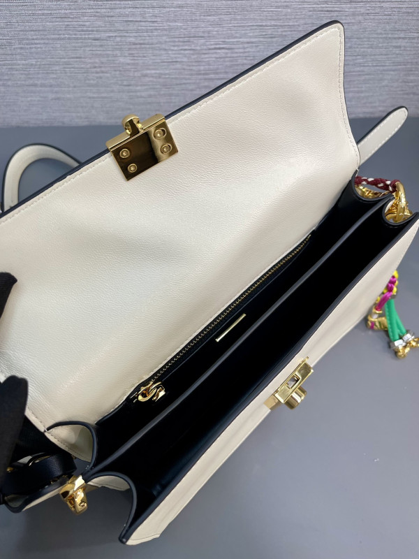 Pra*a soft sound small leather shoulder bag with charms
